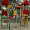 Strasse Gamarnika: gl"uckliche Kinder Spielplatz