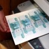 Un r'esident de Khabarovsk a essay'e de payer un faux dans Primorye