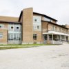 The new school was built near the village of